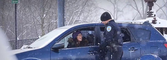 Police officer stops a car for traffic violation. Moments later, miracle happens!