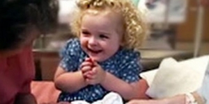 Darling girl calms newborn sister by doing the sweetest thing. Awwww!