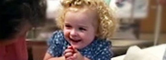 Darling girl calms newborn sister by doing the sweetest thing. Awwww!