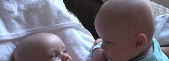 These twins are having some serious secret talk with each other. So Adorable!