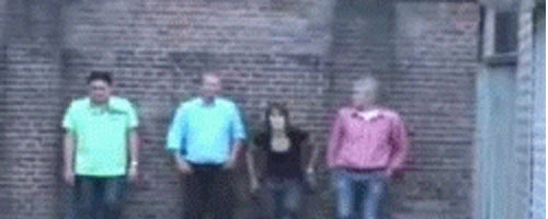 Four people in a foot race that ends up really badly