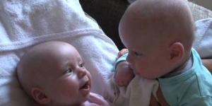 These twins are having some serious secret talk with each other. So Adorable!