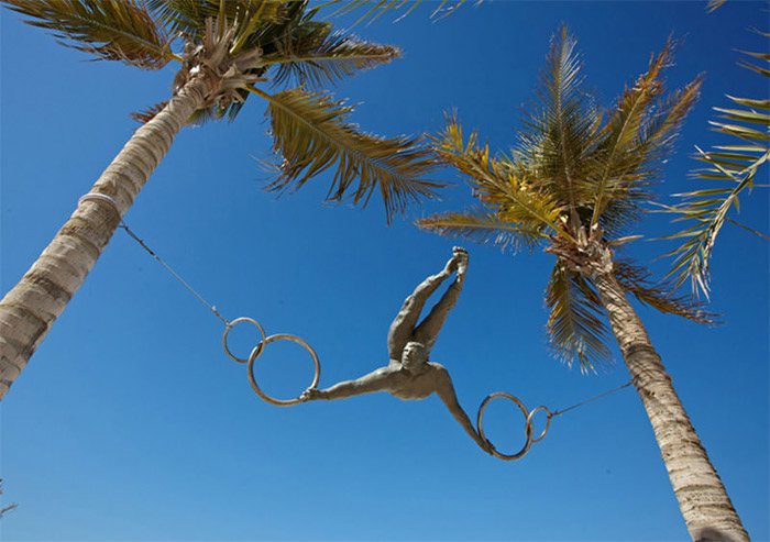 Circus Act Between Coconut Tree Sculpture by Jerzy Kedziora